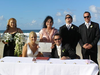 Prenetation of Marriage Cerrtificate to Anglea and David at their Marriage on Palm Beach on the Gold Coast